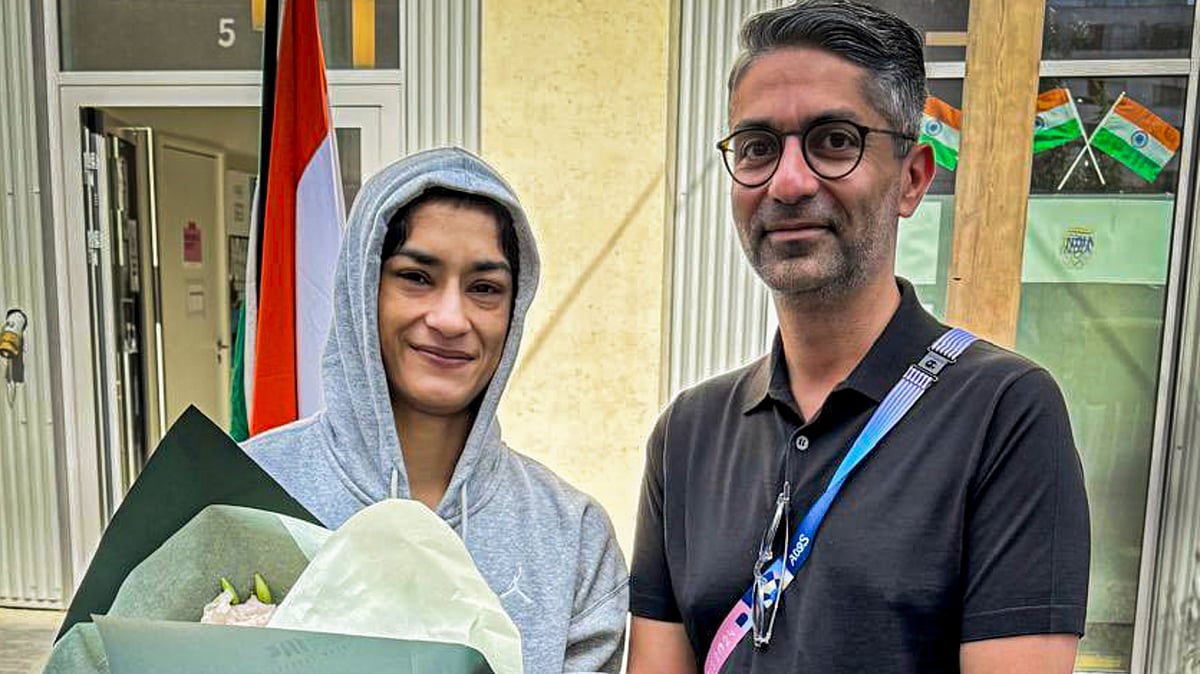 PTI : Abhinav Bindra meets Vinesh Phogat during the Paris Olympics 2024. 